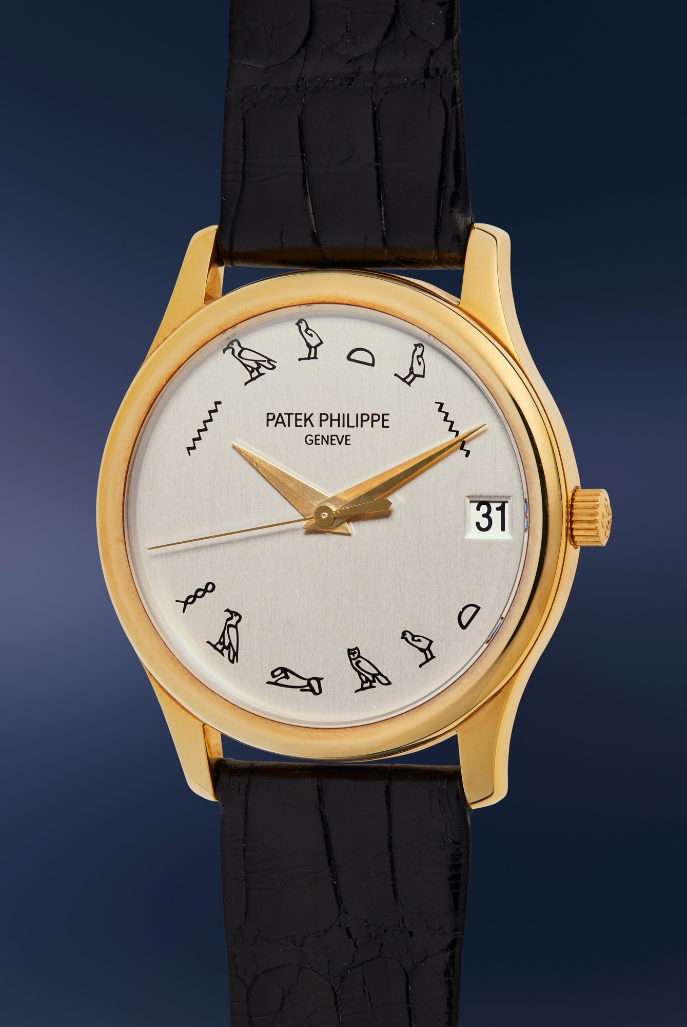 <p><strong>PATEK PHILIPPE</strong>, 3998J Heiroglyph - A unique, extremely rare, culturally significant, and highly attractive yellow gold wristwatch with Egyptian hieroglyph dial, date, hang tag and presentation box</p>