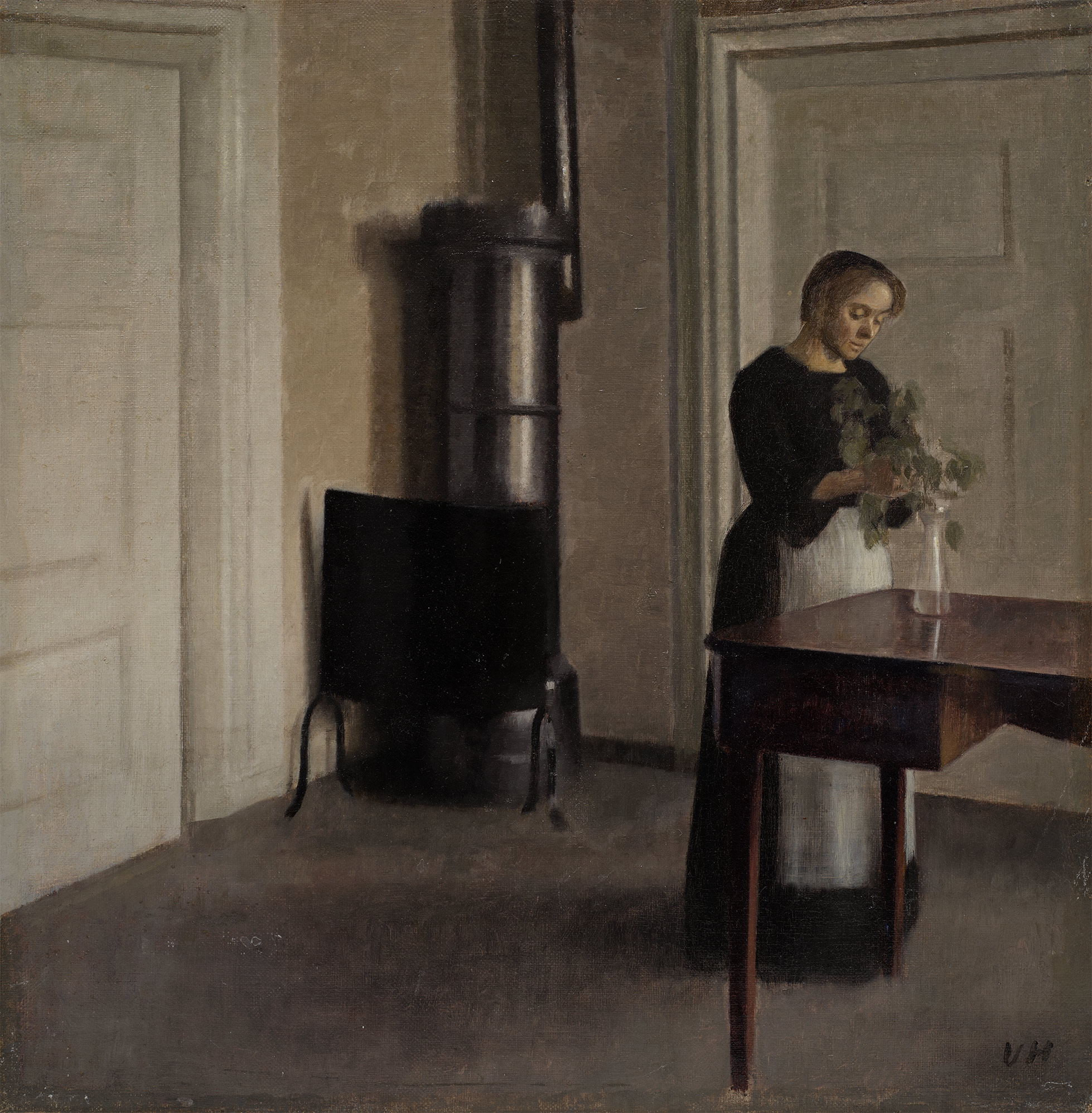 <p><strong>VILHELM HAMMERSH&Oslash;I</strong> <em>Interior of Woman Placing Branches in Vase on Table Interior of Woman Placing Branches in Vase on Table (Interi&oslash;r med kvinde, der stiller grene i et glas, Strandgade 30),</em> 1900</p>
