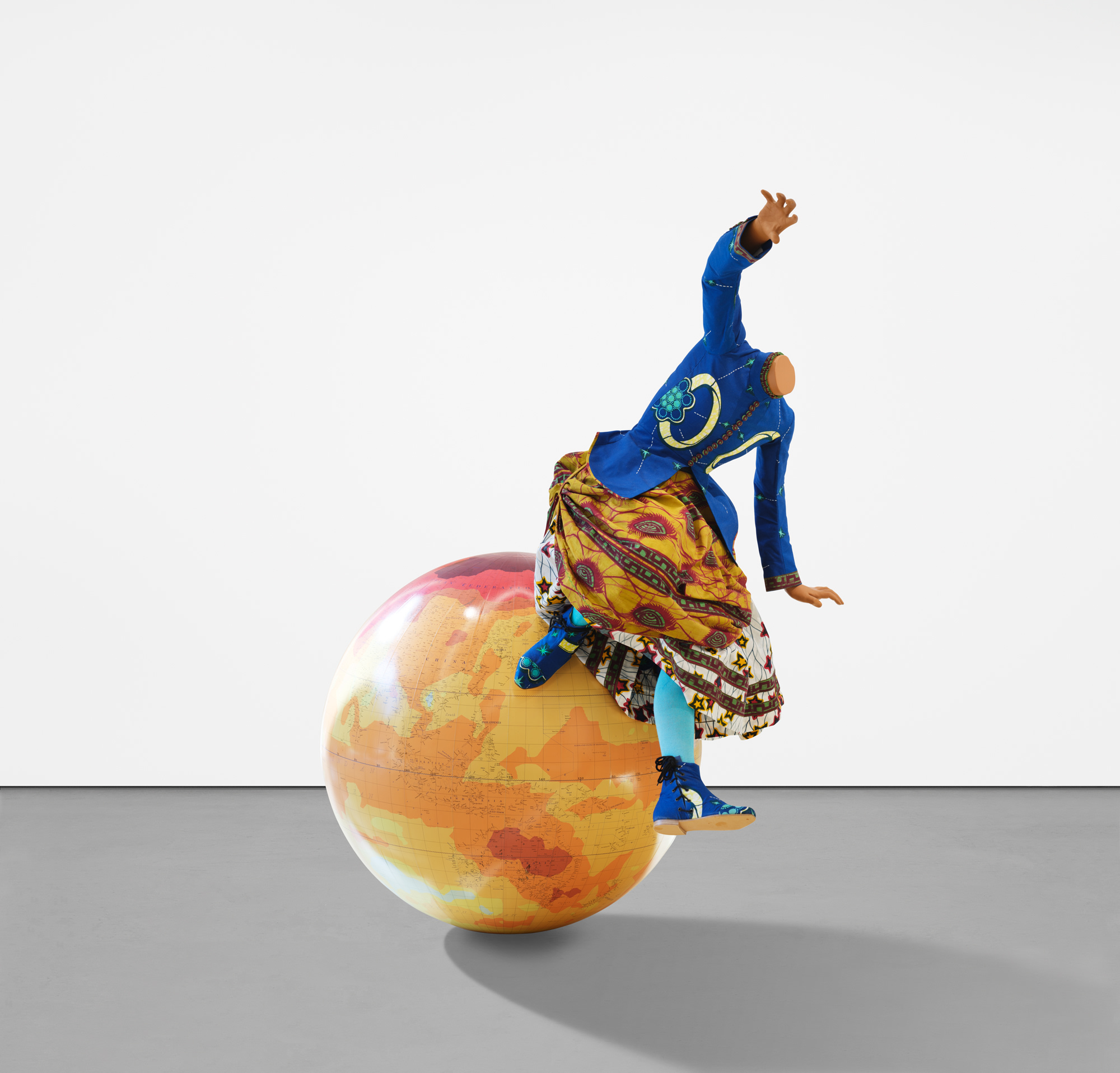 <p><strong>YINKA SHONIBARE CBE RA </strong><em>Girl on Globe 3</em>, 2011</p>
