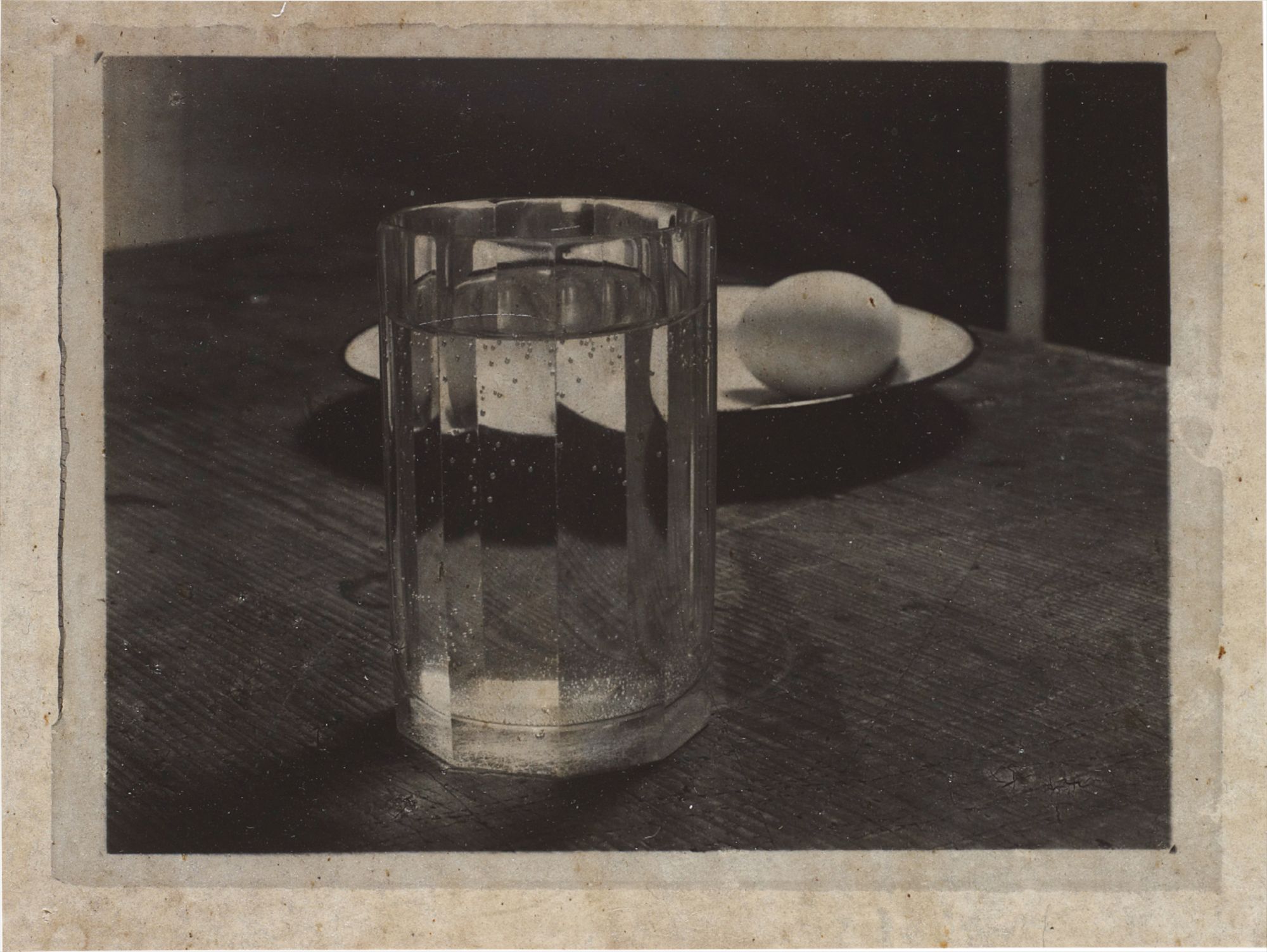 <b>JOSEF SUDEK</b> <i>Glass and egg on a plate</i>, 1951