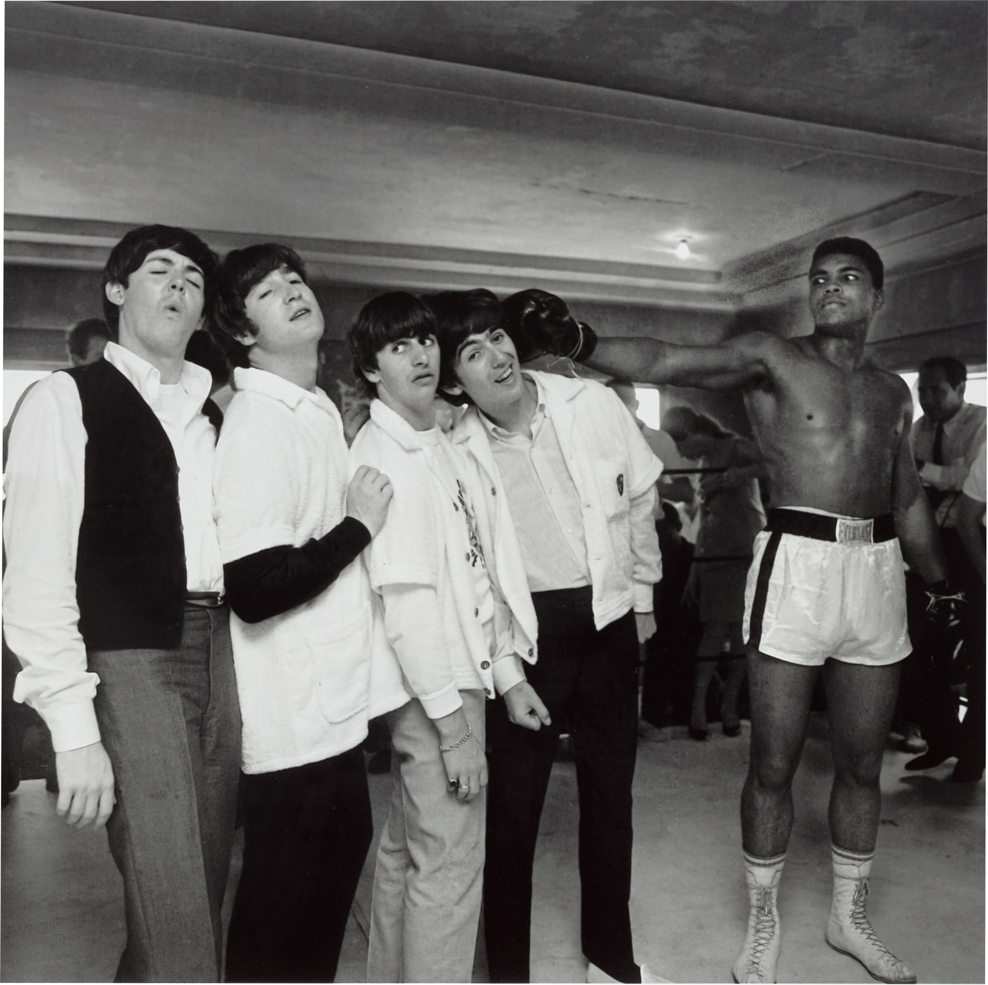 <p><strong>HARRY BENSON</strong> <em>Muhammad Ali and The Beatles</em>, 1965</p>

