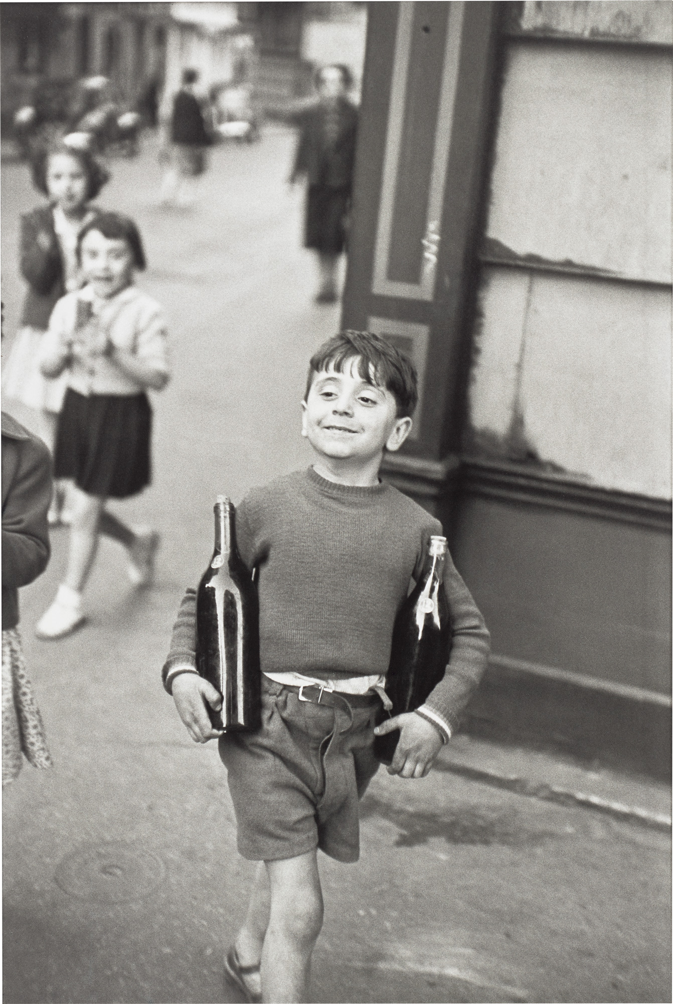 <p><strong>HENRI CARTIER-BRESSON </strong><em>Rue Mouffetard, Paris</em>, 1954</p>
