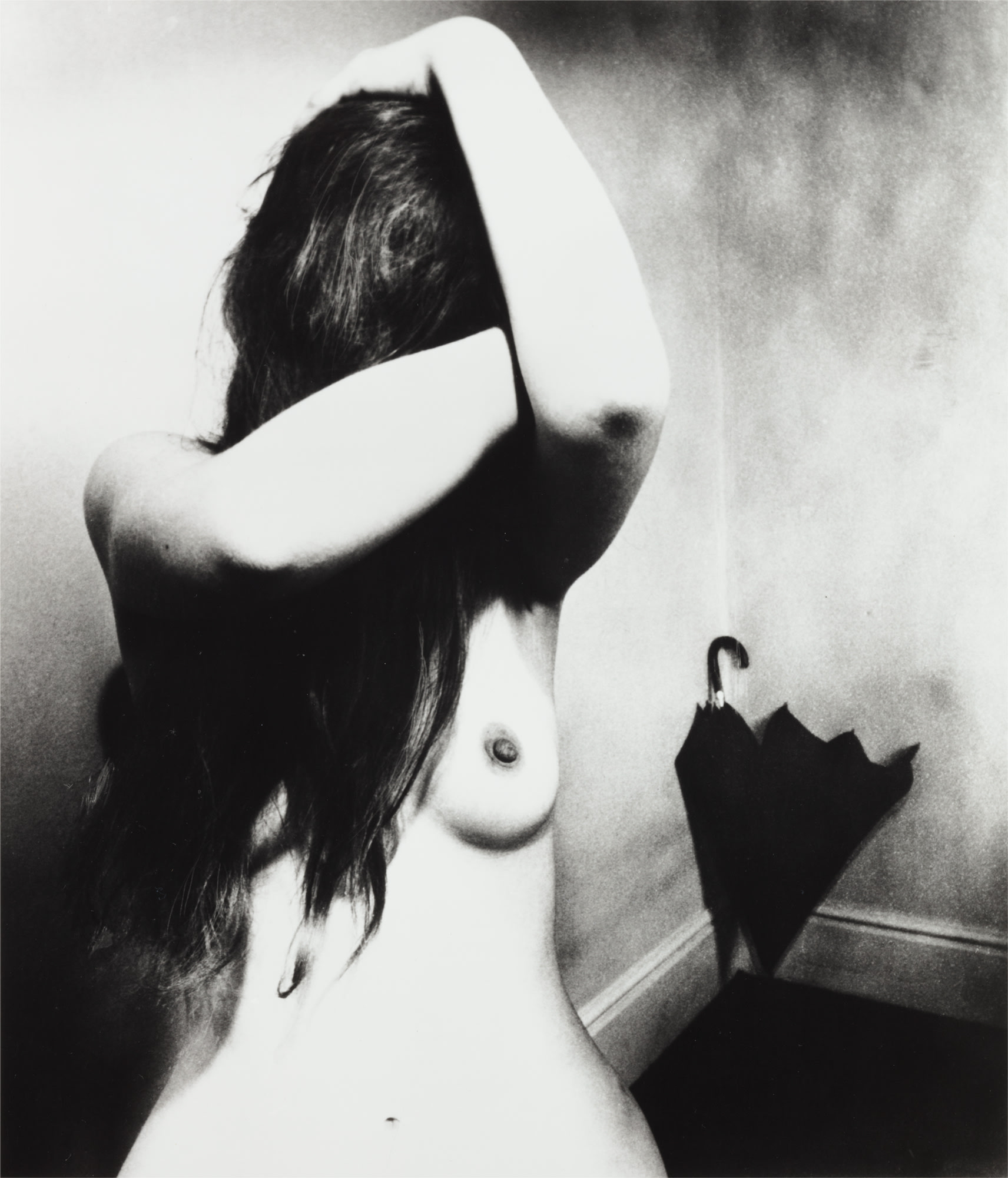 <p><strong>BILL BRANDT</strong> <em>Campden Hill (With Umbrella), London</em>, 1978</p>