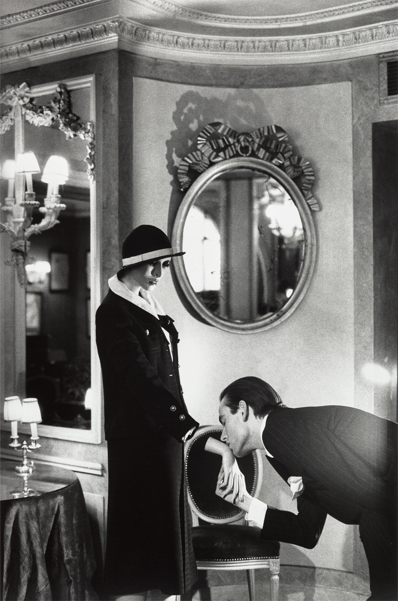 <p><strong>HELMUT NEWTON</strong> <em>Upstairs at Maxim's</em>, 1978</p>