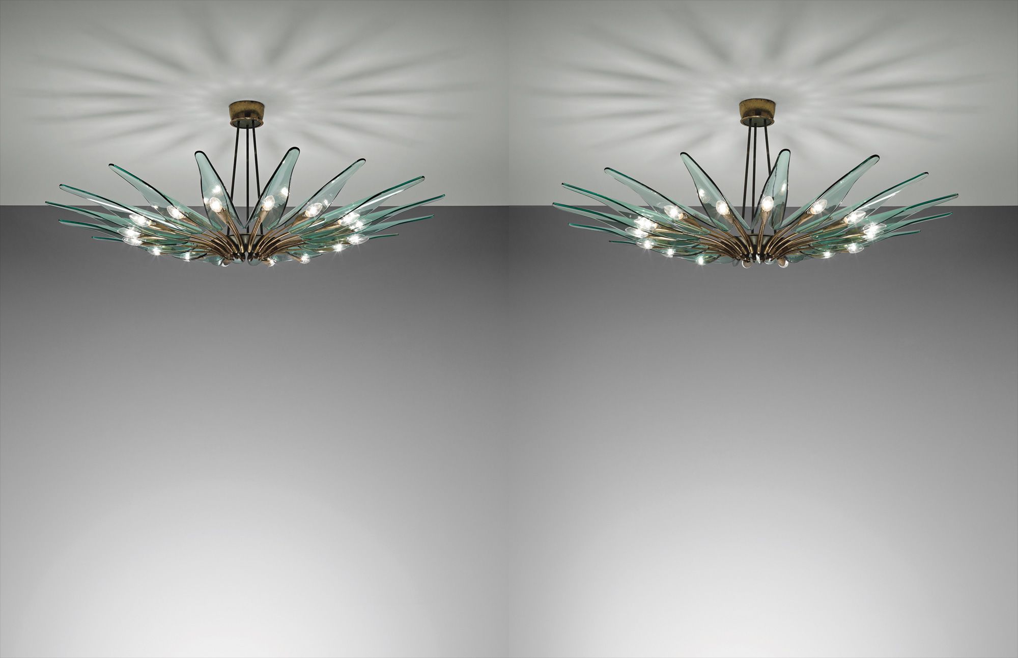 <b>MAX INGRAND</b> <i>Pair of 'Dahlia' sixteen-armed chandeliers, model no. 1563</i>, circa 1954