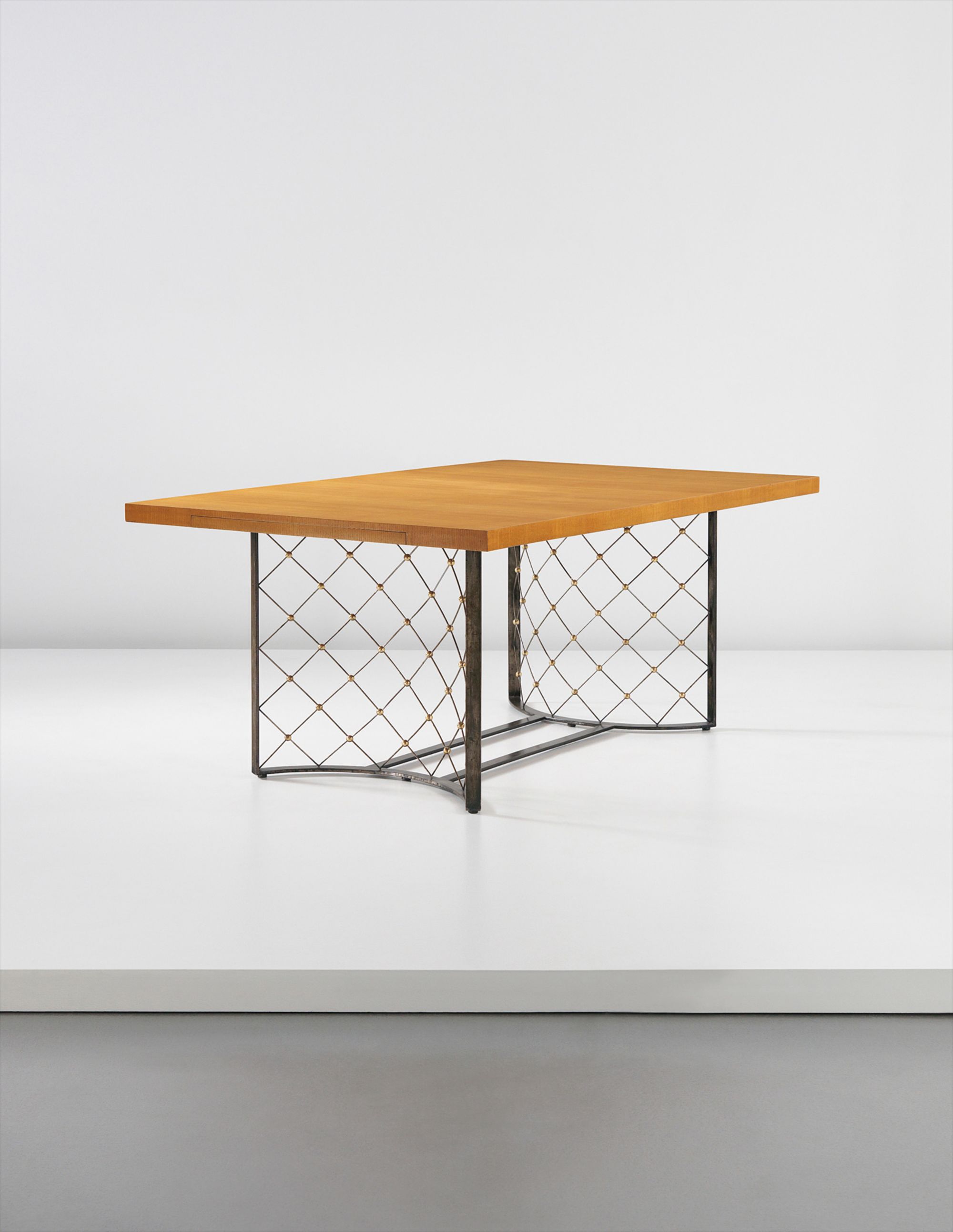 <b>JEAN ROYÈRE</b> <i>Important and unique ‘Tour Eiffel’ extendable dining table</i>, circa 1963