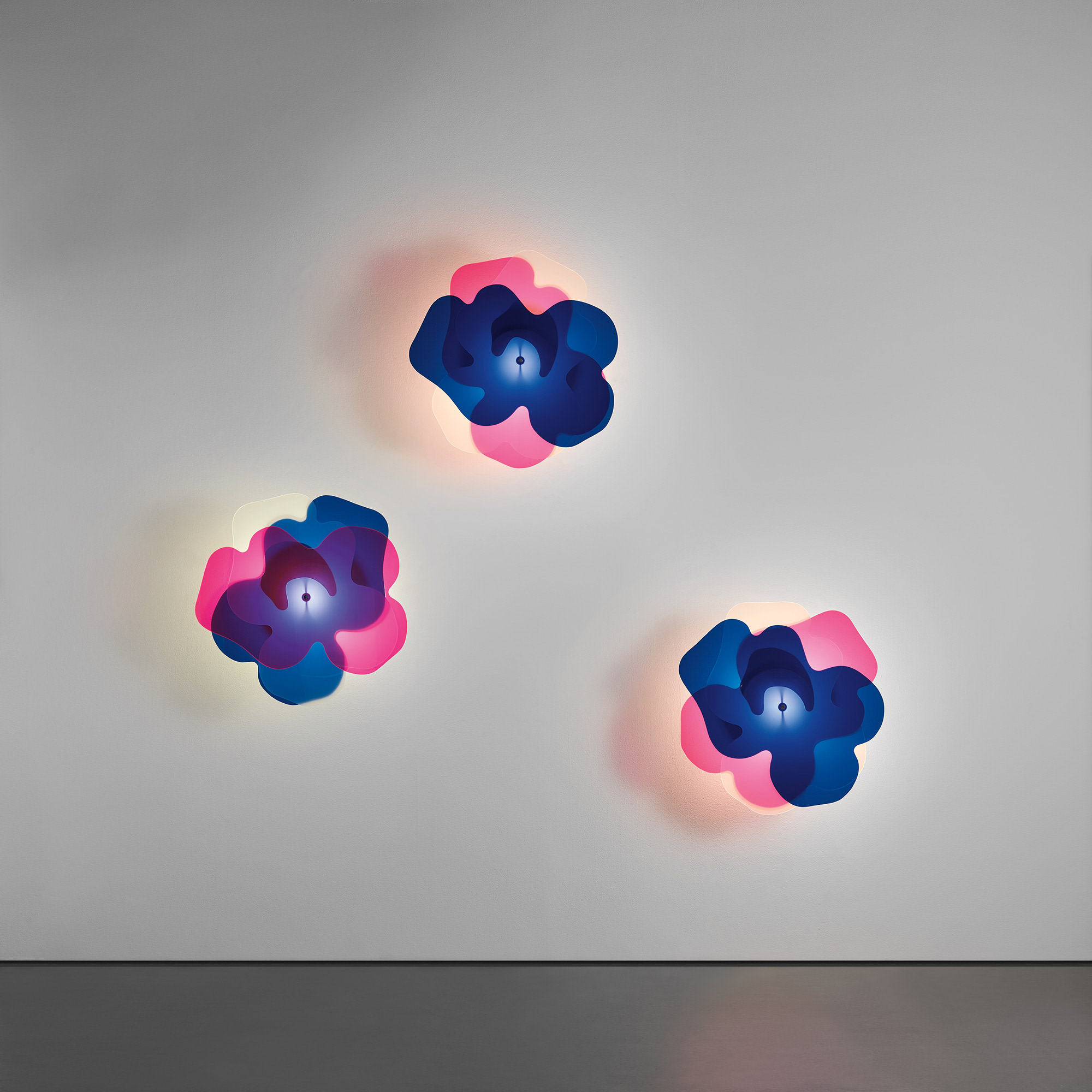 <p><strong>LUMENFORM </strong><em>Set of three rare ‘Vanesia’ wall lights,</em> circa 1970 </p>