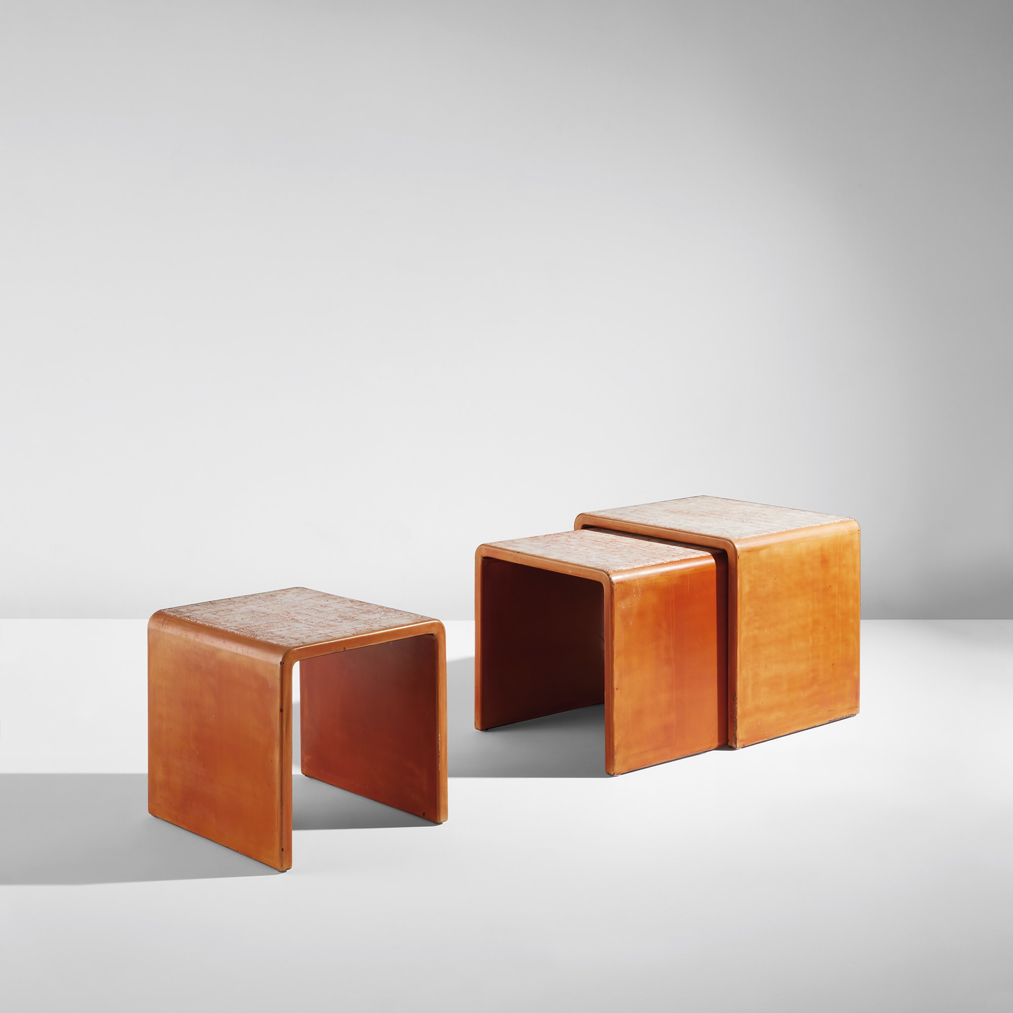 <p><strong>JEAN DUNAND</strong> <em>Set of three nesting tables</em>, circa 1925</p>