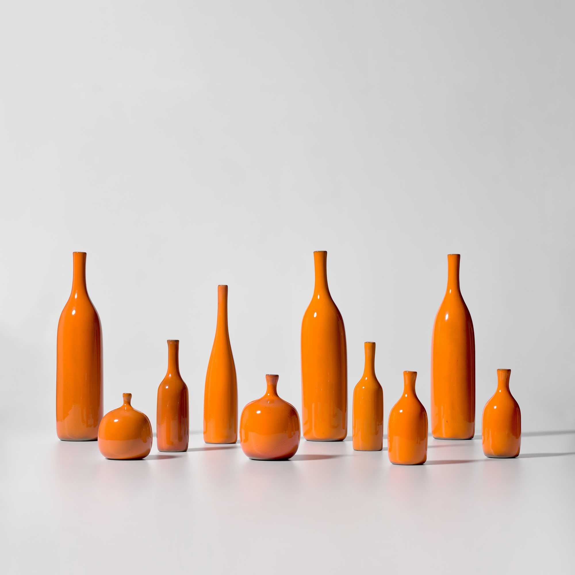 <p><strong>JACQUES RUELLAND AND DANI RUELLAND</strong> <em>Group of eight vases from the 'Bouteilles' series and two vases from the 'Boules' series</em>, circa 1960</p>