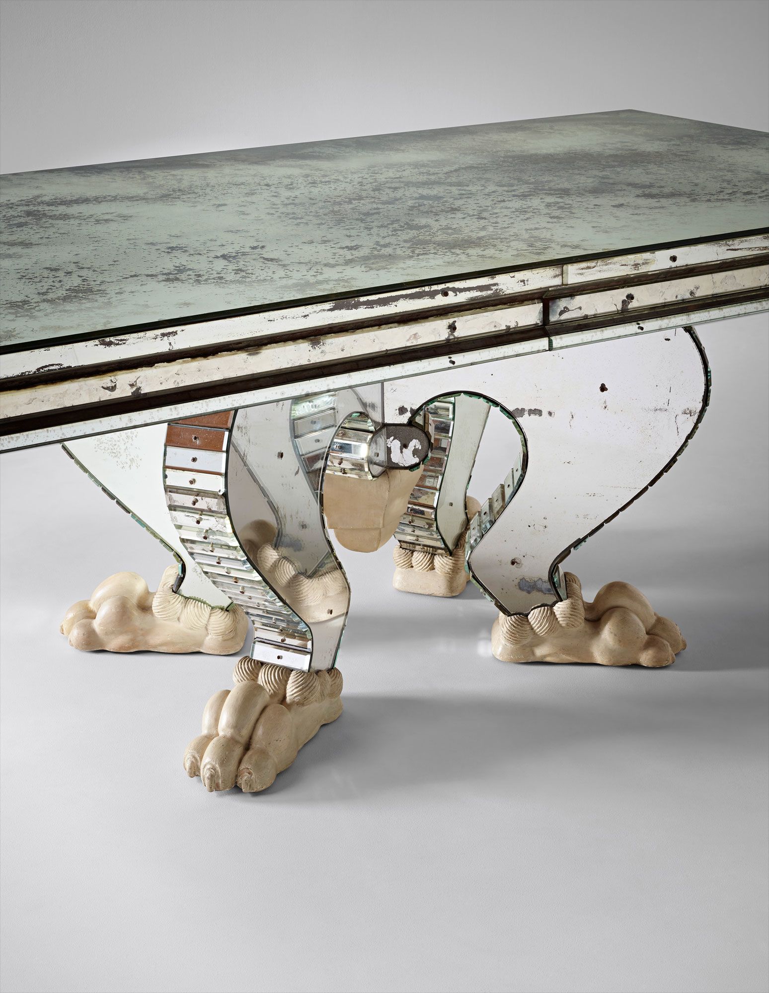<b>SERGE ROCHE</b> <i>Important mirrored table, designed for Ren&#233;e Saint-Cyr,</i> circa 1936