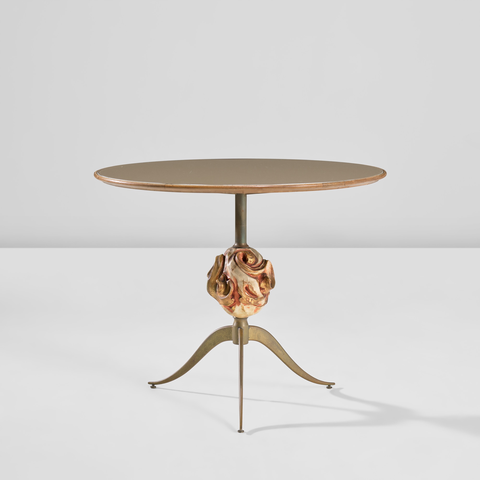 <p><strong>OSVALDO BORSANI AND LUCIO FONTANA</strong>&nbsp;<em>Rare coffee table,</em>&nbsp;<em>from</em>&nbsp;<em>Casa Kramer,</em>&nbsp;<em>Milan,</em>&nbsp;circa 1951</p>
