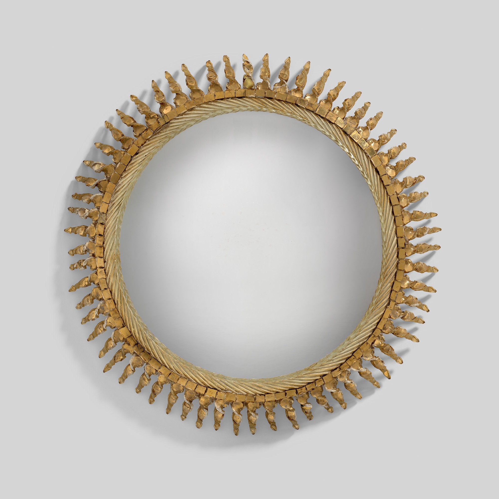 <p><strong>LINE VAUTRIN</strong> <em>&#39;Soleil torsad&eacute;&#39; mirror, </em>circa 1960</p>
