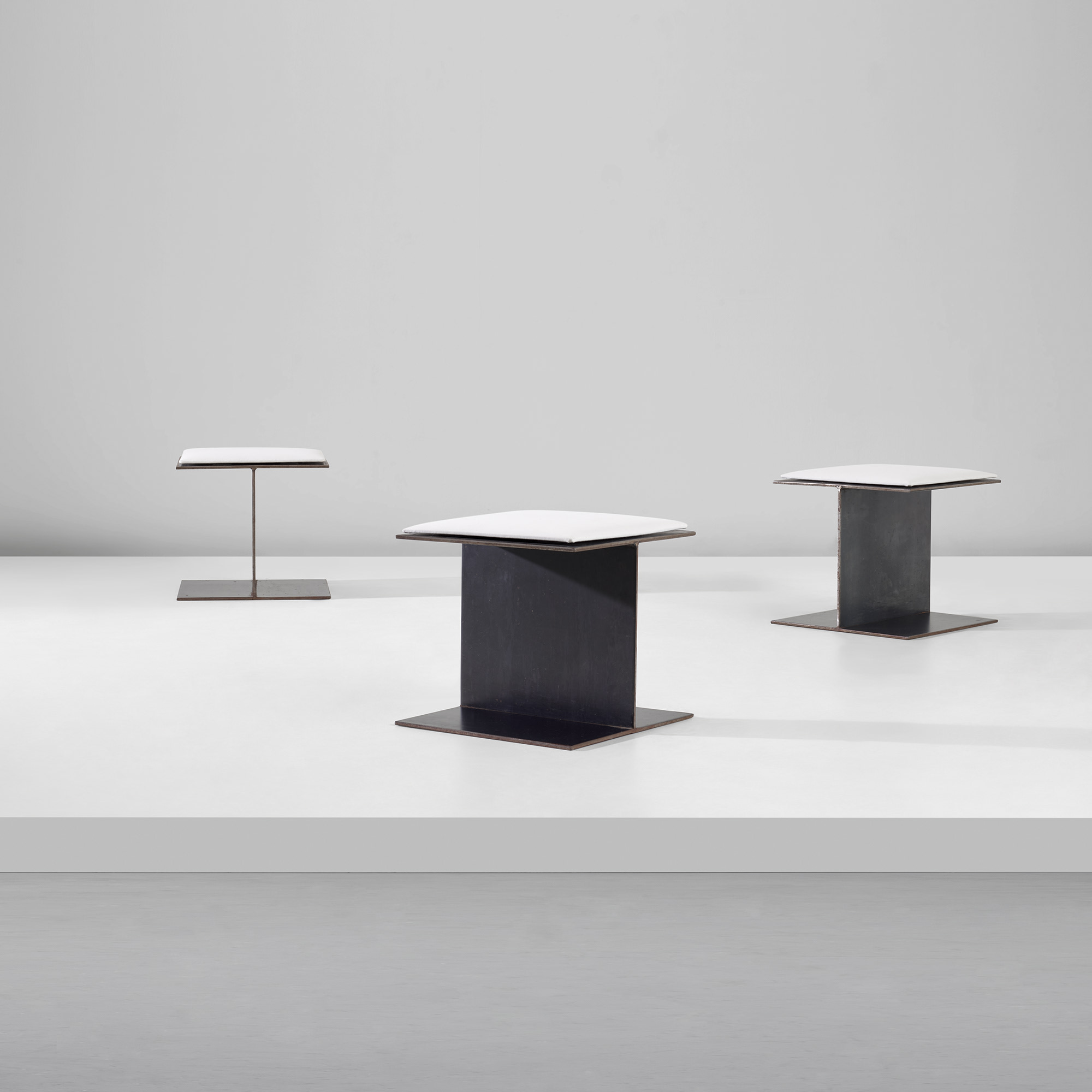 <p><strong>BERNAR VENET</strong> <em>Set of three stools, </em>circa 2001</p>
