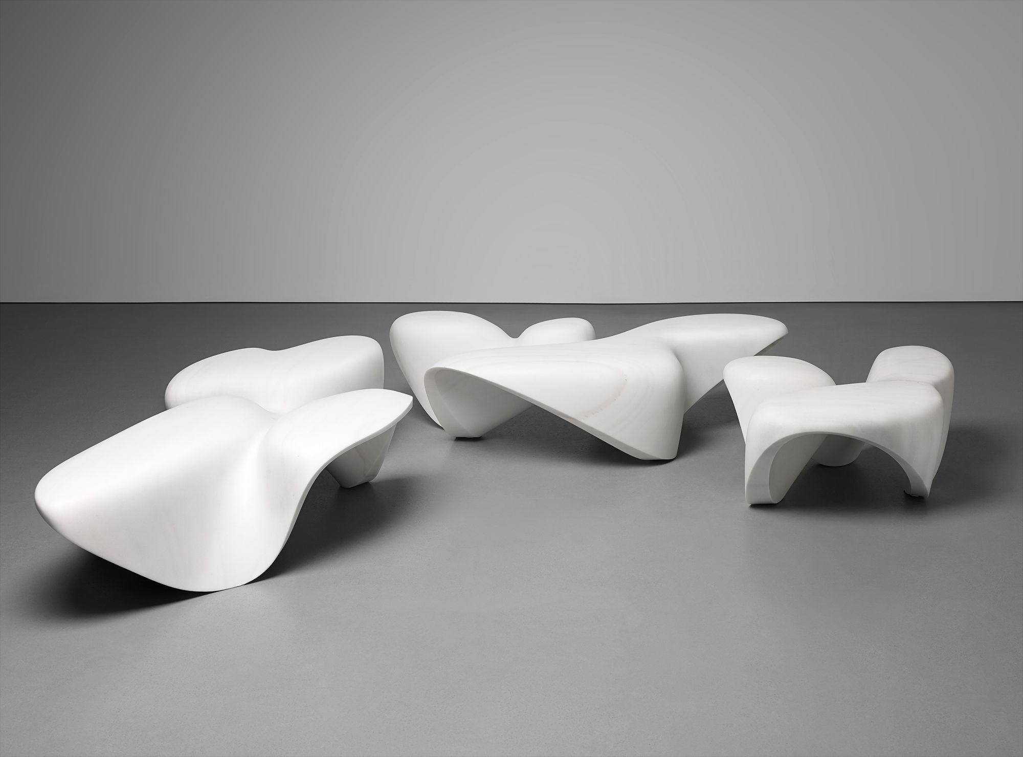 <b>ZAHA HADID </b><i>Set of three 'Bianco Covelano' low tables, from the 'Mercuric' collection,</i> 2012 – donated by the Zaha Hadid Foundation