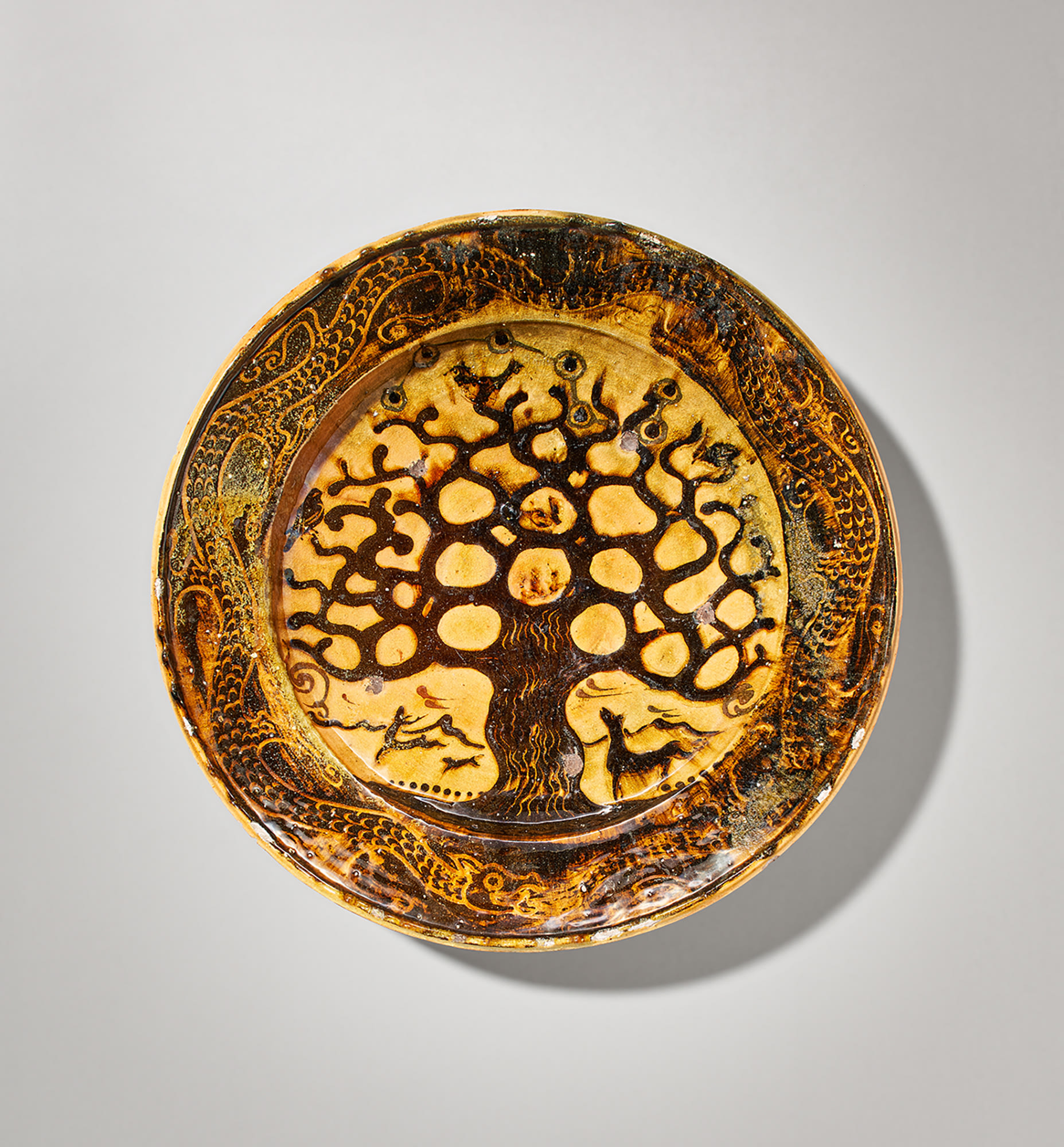 <p><strong>BERNARD LEACH</strong> <em>Charger with &#39;Tree of Life&#39; design</em>, circa 1924</p>

