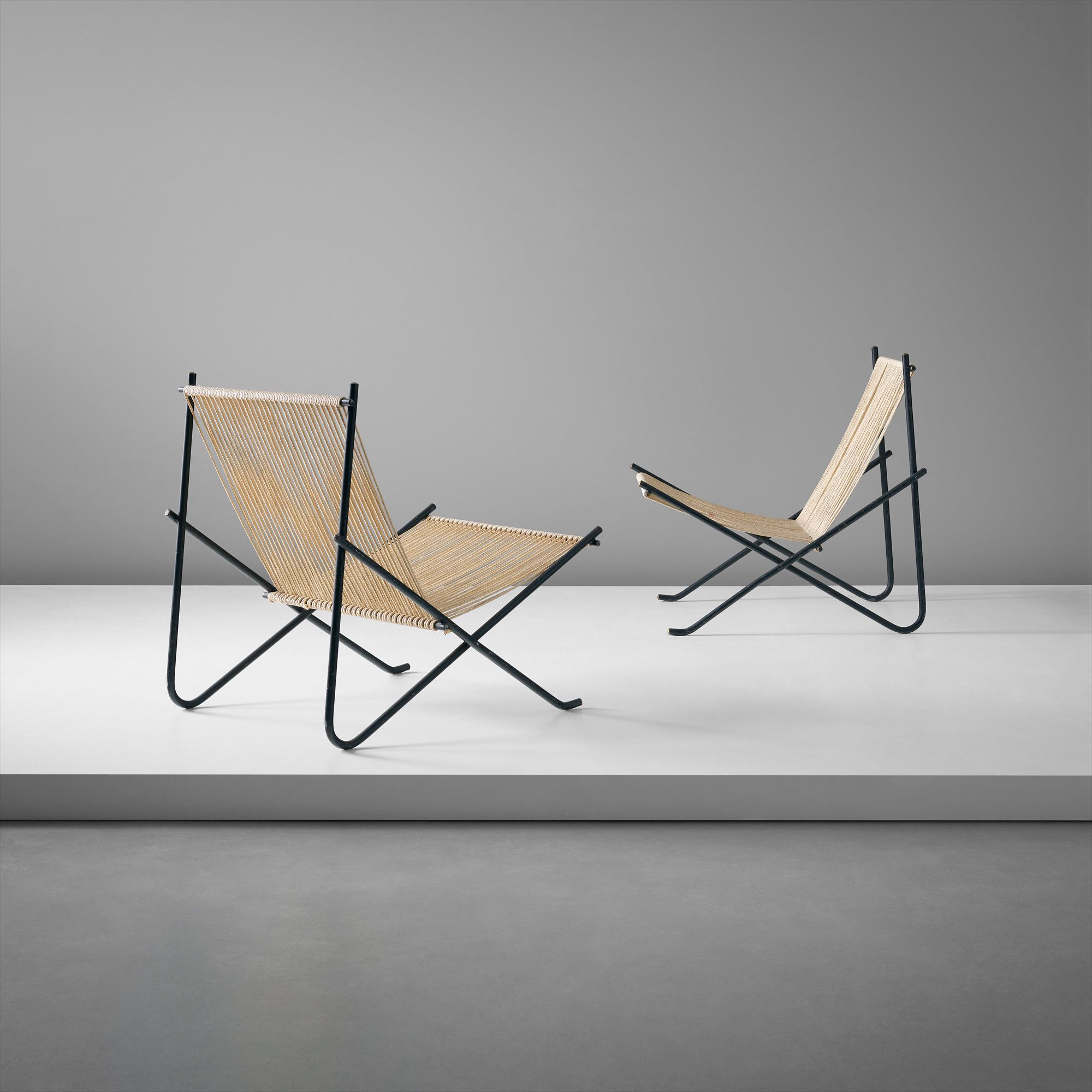 <b>POUL KJ&#198;RHOLM</b> <i>Pair of lounge chairs, designed 1952</i>, produced circa 1953