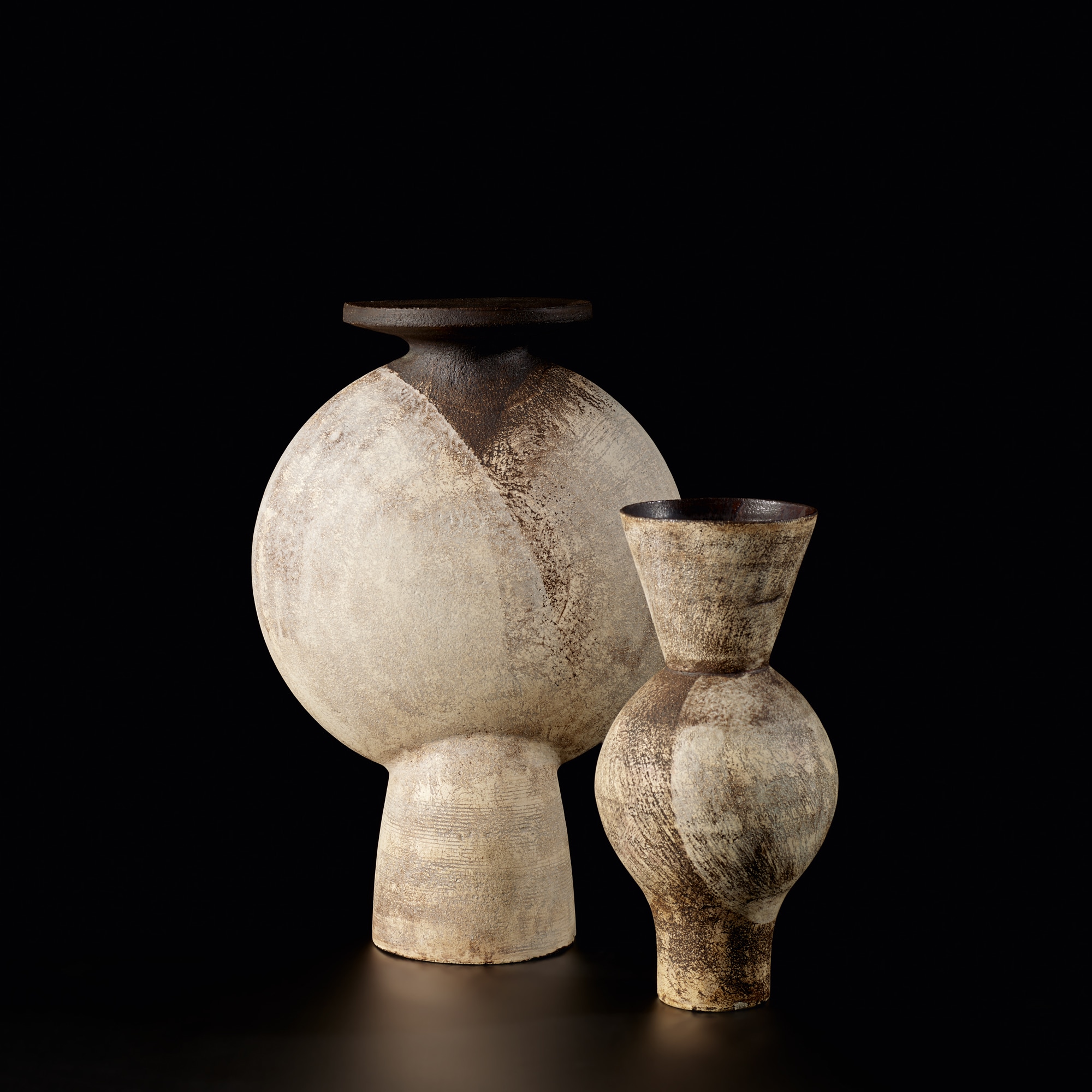 <p><strong>HANS COPER</strong> <em>Composite vase</em>, circa 1954 and <em>Large vase with central volume</em>, circa 1954&nbsp;</p>
