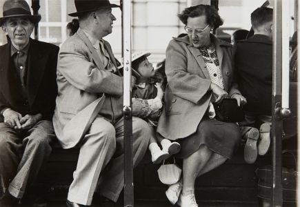 Dorothea Lange - Two Men and a Woman on a Street Car