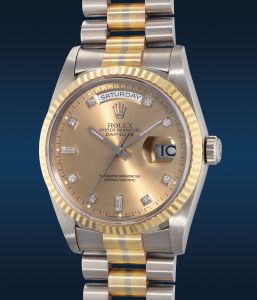 Rolex date two outlet tone