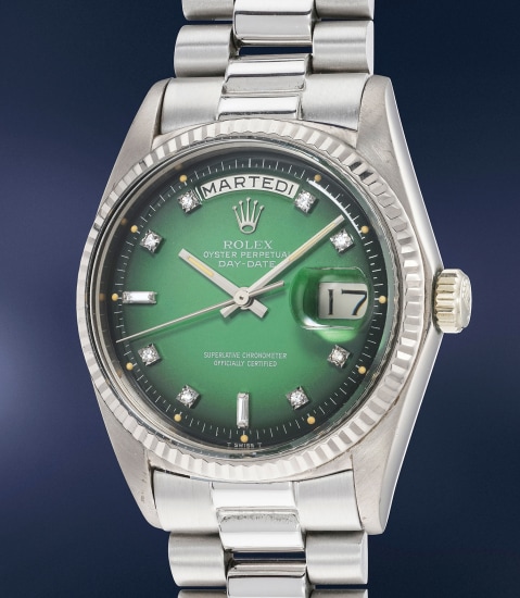 Rolex submariner green bezel and dial. Double cuffs white gold