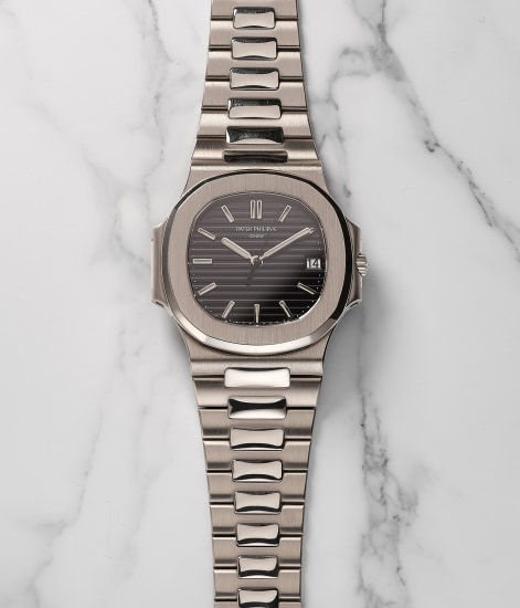 Patek philippe nautilus date hotsell sweep seconds