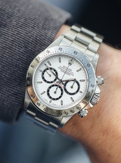 rolex daytona silver bezel