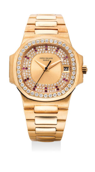 patek philippe yellow gold nautilus with baguette diamond bezel