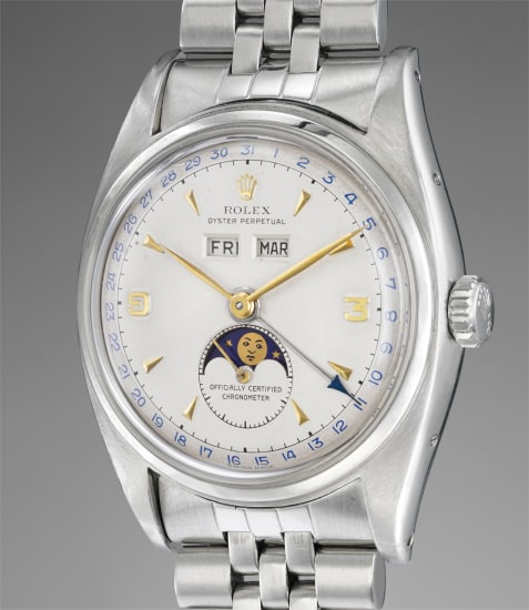 rolex an extremely rare highly attractive and important stainless steel triple calendar wristwatch with two tone dial moonphases and bracelet 1953 phillips two tone dial moonphases and bracelet