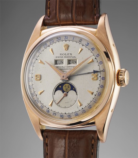 rolex an exceptionally fine rare and important pink gold triple calendar wristwatch with moonphases and two tone dial circa 1953 phillips pink gold triple calendar wristwatch