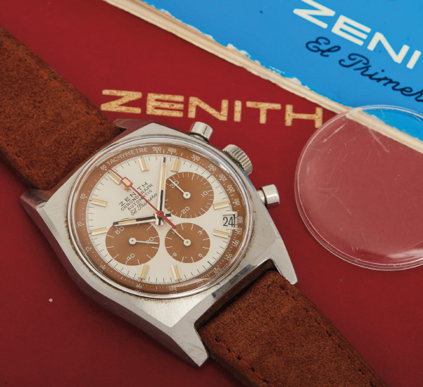 A very attractive and fine stainless steel chronograph wristwatch with “tropical” registers and tachymeter scale, accompanied by original presentation box and literature