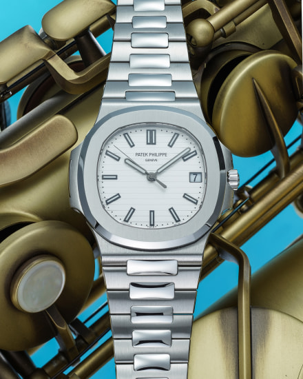PATEK PHILIPPE. A VERY RARE AND FINE STAINLESS STEEL AUTOMATIC WRISTWATCH  WITH SWEEP CENTRE SECONDS, DATE AND BRACELET