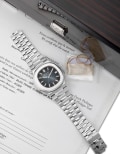 Patek Philippe 
Ref. 5711/1A-010
A very fine and rare stainless steel wristwatch with center seconds, date, bracelet, Certificate of Origin and presentation box